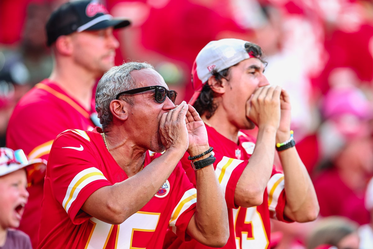 Kansas City Chiefs fans yelling during a game.